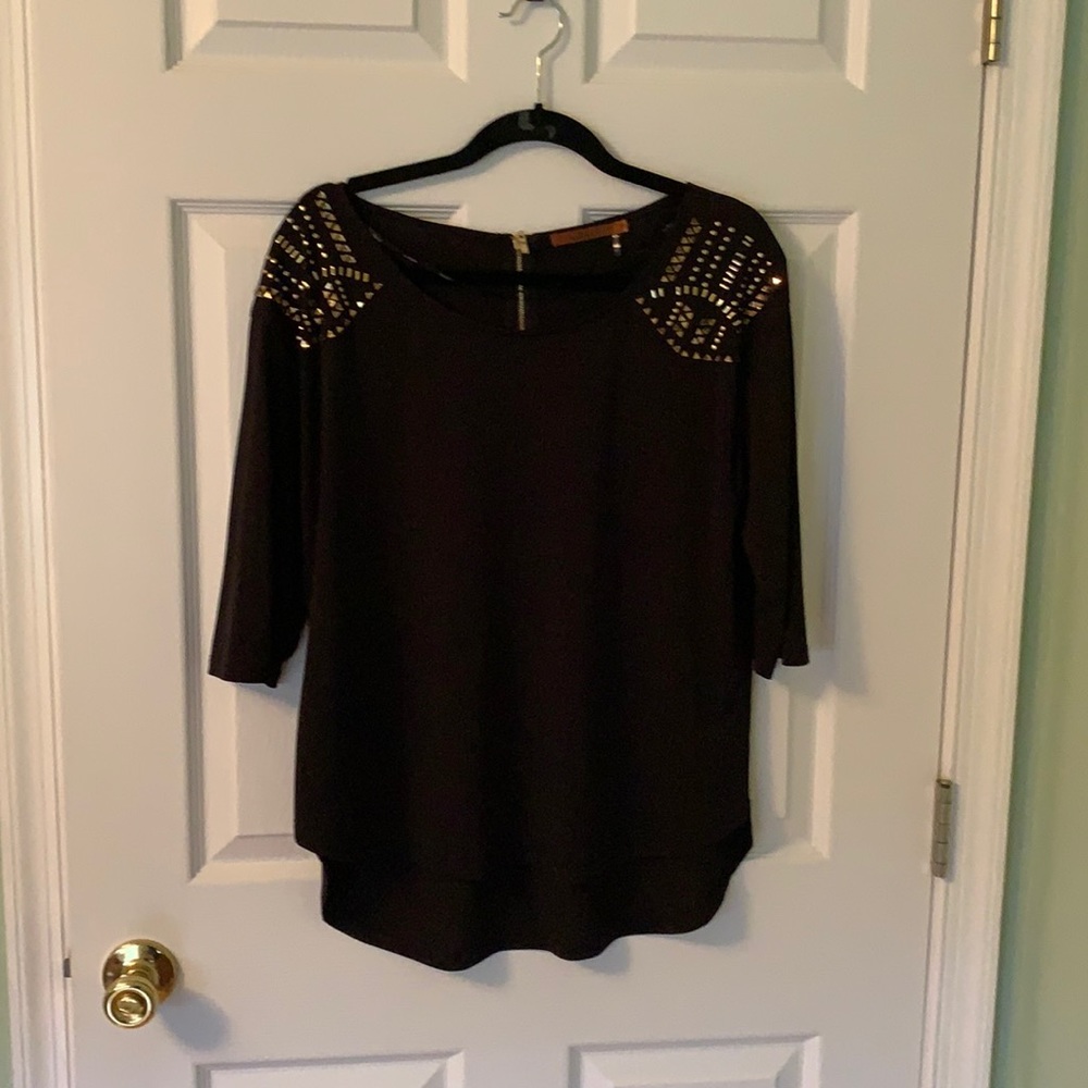 Black top with gold embellishments